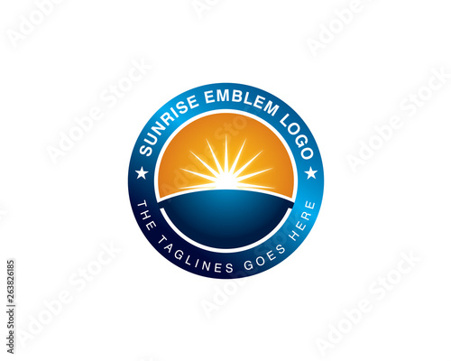 sun rays rise on ground globe earth inside circular round emblem