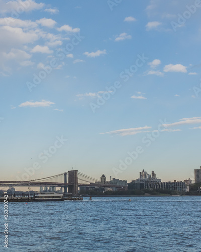 Brooklyn and Manhattan bridge over East River  with skyline of Brooklyn, viewed from Manhattan, New York, USA © Mark Zhu