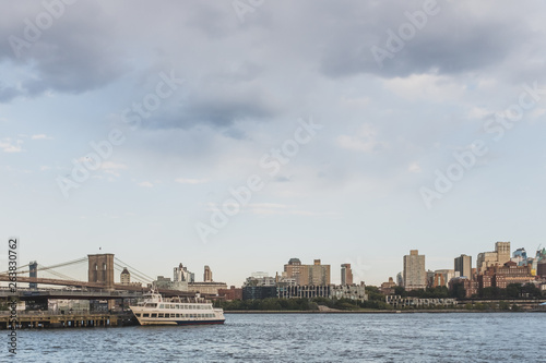 Brooklyn and bridge over East River with skyline of Brooklyn, viewed from lower Manhattan, New York, USA © Mark Zhu