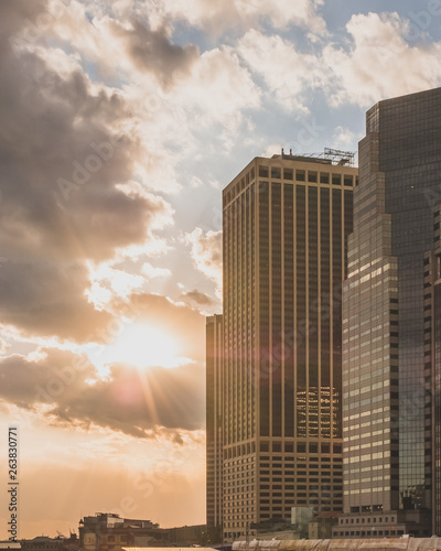 Skyscrapers of Manhattan against sunset, in New York City, USA