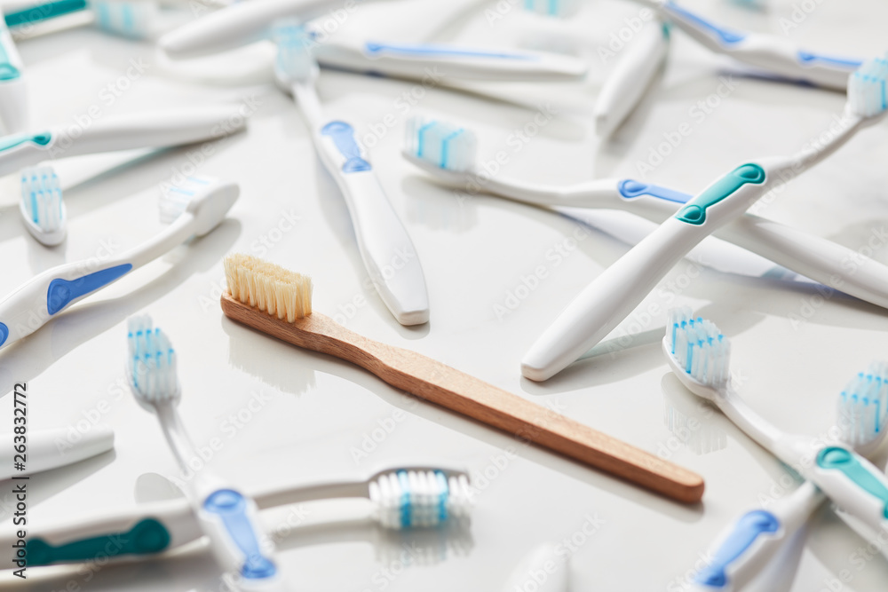 Pile of plastic toothbrushes and bamboo one. Pile of plastic toothbrushes and bamboo one.