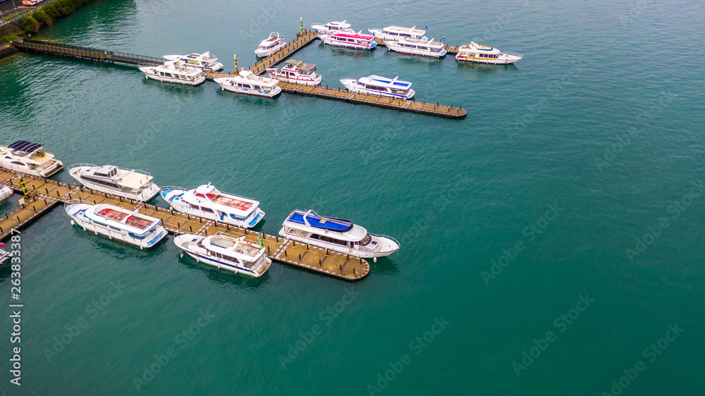Boats in the harbor at Sun Moon Lake, Shuishe Pier in Nantou, Taiwan, Aerial top view.