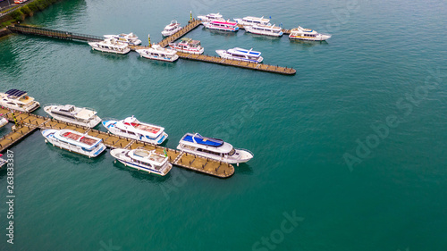 Boats in the harbor at Sun Moon Lake, Shuishe Pier in Nantou, Taiwan, Aerial top view. photo