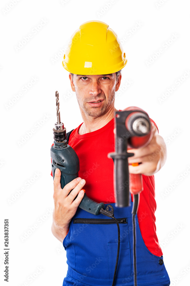 wild man with helmet and drilling machine