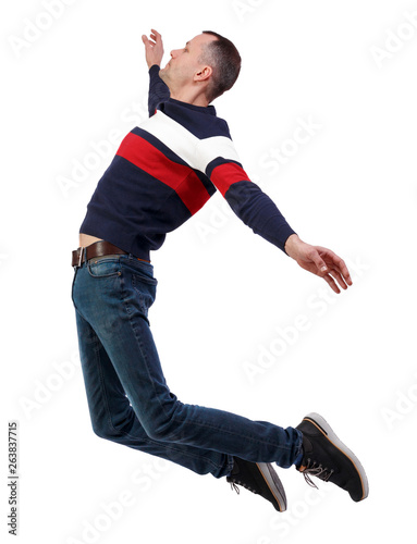 Side view of man in zero gravity or a fall.