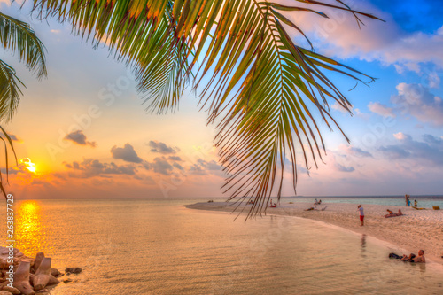 Sunset on the beach of a Maldives island