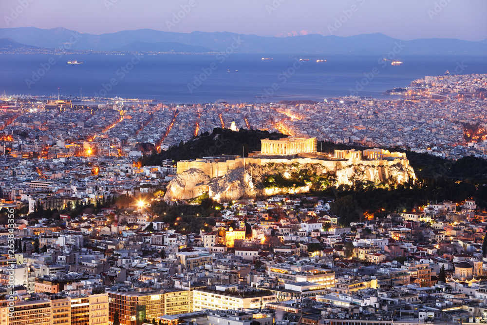 Athens skyline panorama with Acropolis in Greece from peak Lycabettus at night