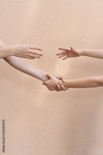 A pair of hand symbolising kindness, caring and help photo