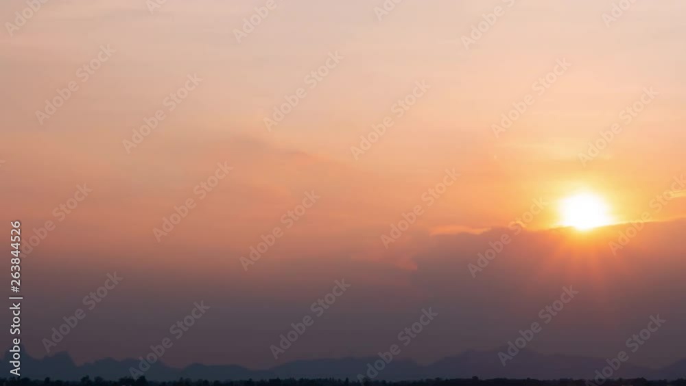 Time lapse nature background. Sunset time interval. The movement of clouds and Sun. Time lapse nature background. Sunset time interval. The movement of clouds and Sun.