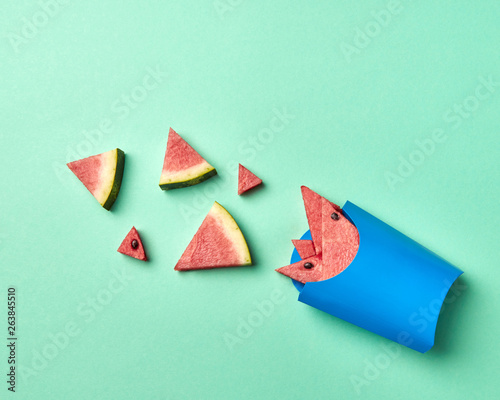 Juicy slices of watermelon in a paper cup - healthy natural orga photo