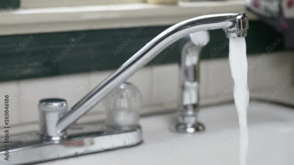 Washing Apple in Kitchen Sink SLIDE RIGHT Washing Apple in Kitchen Sink SLIDE RIGHT