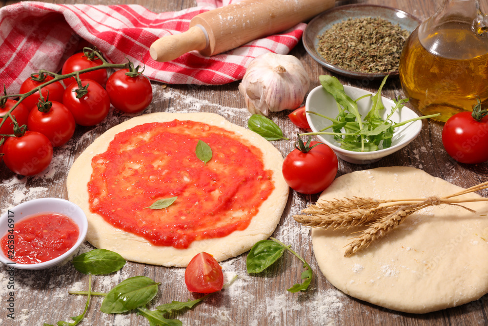 pizza dough with tomato sauce pizza dough with tomato sauce