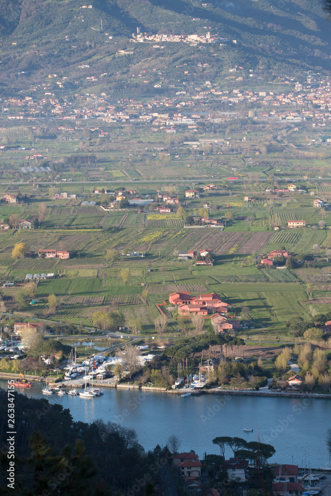 View over Magra River and agricultural plain Tuscany Italy