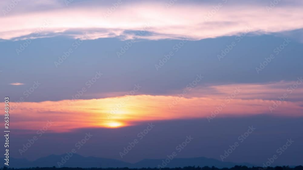 Time lapse nature background. Sunset time interval. The movement of clouds and Sun. Time lapse nature background. Sunset time interval. The movement of clouds and Sun.