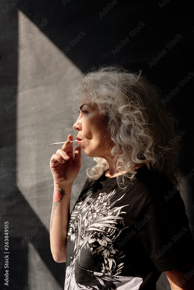 Elderly Woman Smoking Weed