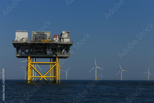 view of the offshore platform and windmills of Rampion windfarm off the coast of Brighton, Sussex, UK