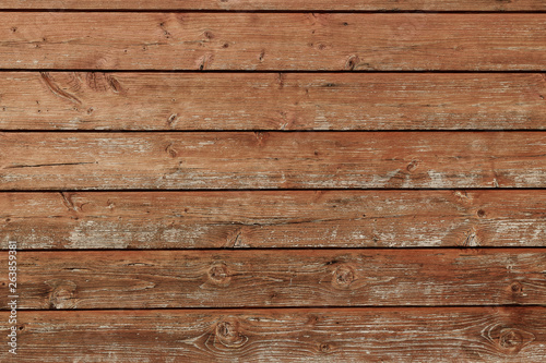 Brown wooden background. Shed wall made from weathered boards.