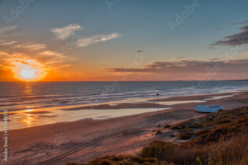 Sunset at the beach of La Barrosa, in Chiclana de la Frontera, a tourist town on the coast of the province of Cadiz, southern Spain