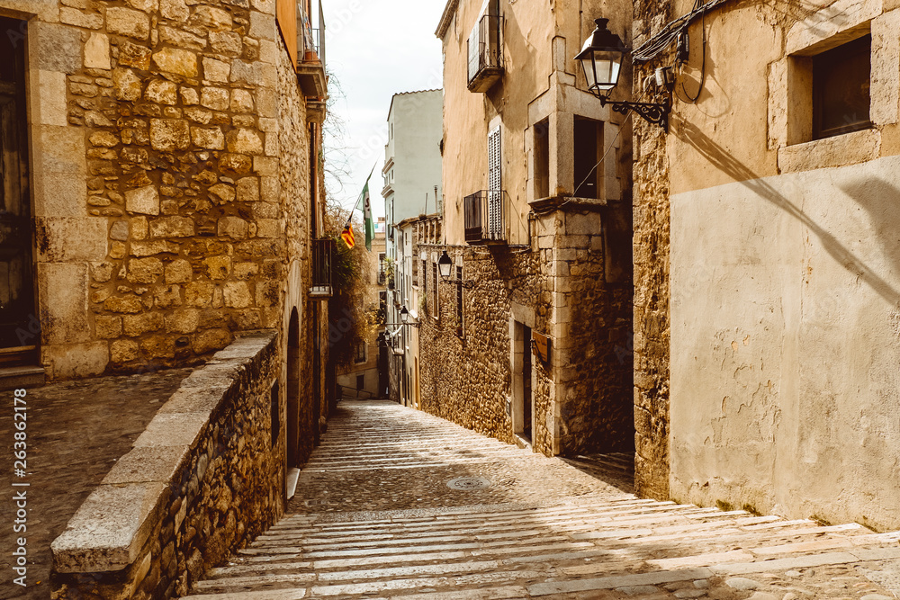 Narrow street in old town. Girona, Catalonia