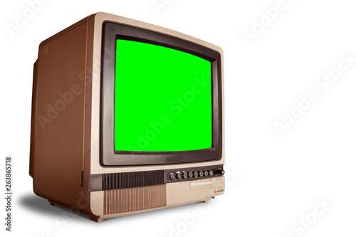 Fotografie side view of old retro home TV receiver with blank green screen isolated on whit