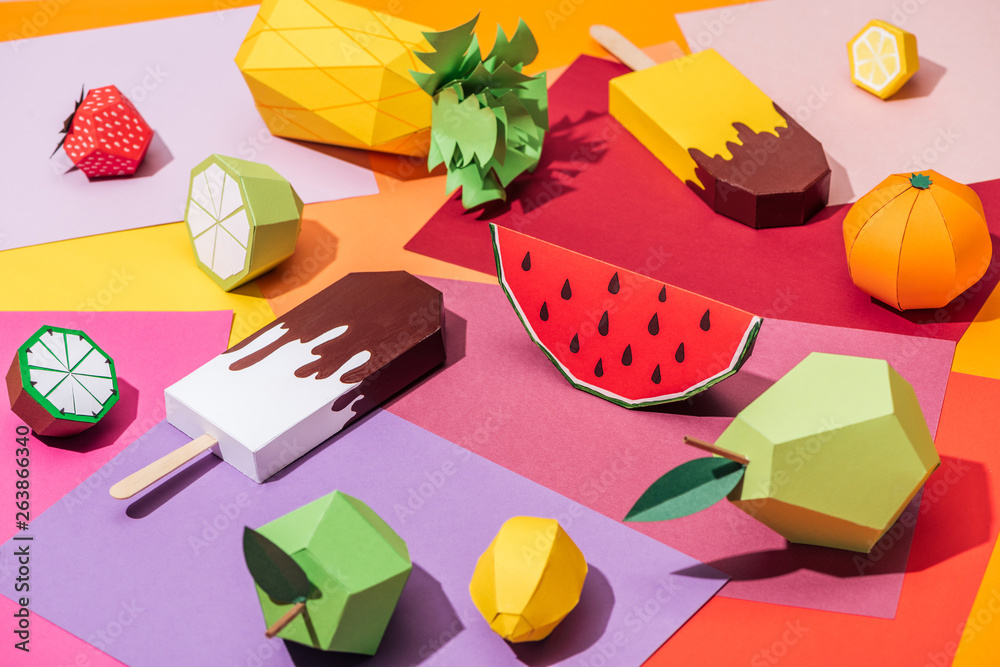 Naklejka origami ice cream and handmade cardboard fruits on multicolored paper