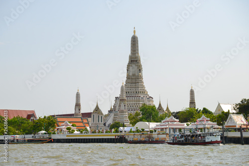 Wat Arun Pagoda Temple with towers in Bangkok, Thailand. Popular thai buddhism landmark around travellers.