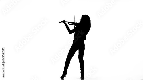 black silhouette on white background young girl in tight black leather clothes expressively plays the electric violin