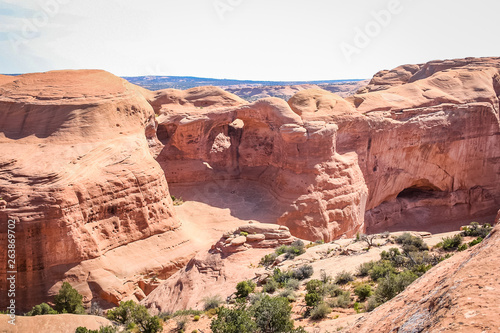 window in red rocks at Moab National Park in Utah