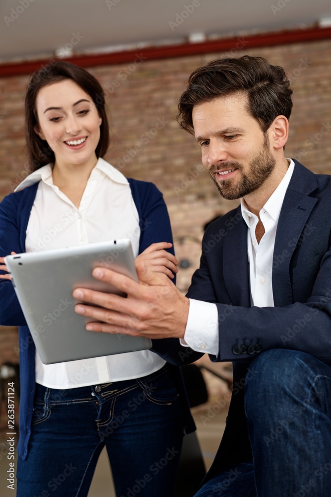 Happy businesspeople with tablet computer Happy businesspeople with tablet computer