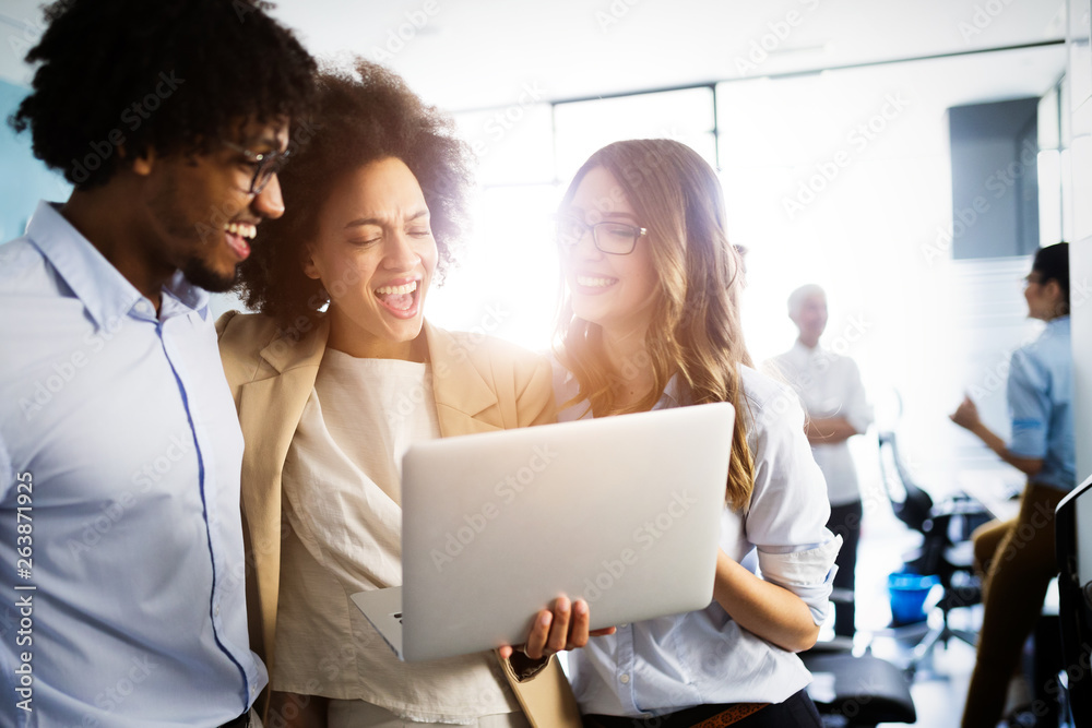 Programmers cooperating at IT company developing apps Programmers cooperating at IT company developing apps