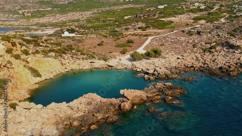 Aerial footage of Voulolimni, a picturesque natural lake-like Lagoon is one of the finest salt-water natural pools in Greece photo