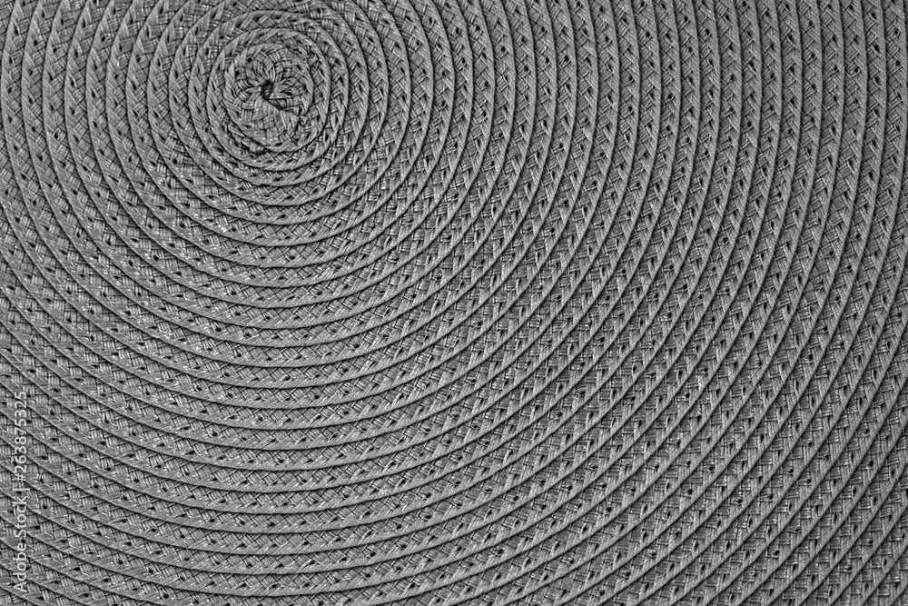 Woven black and grey wicker straw background or texture Woven black and grey wicker straw background or texture