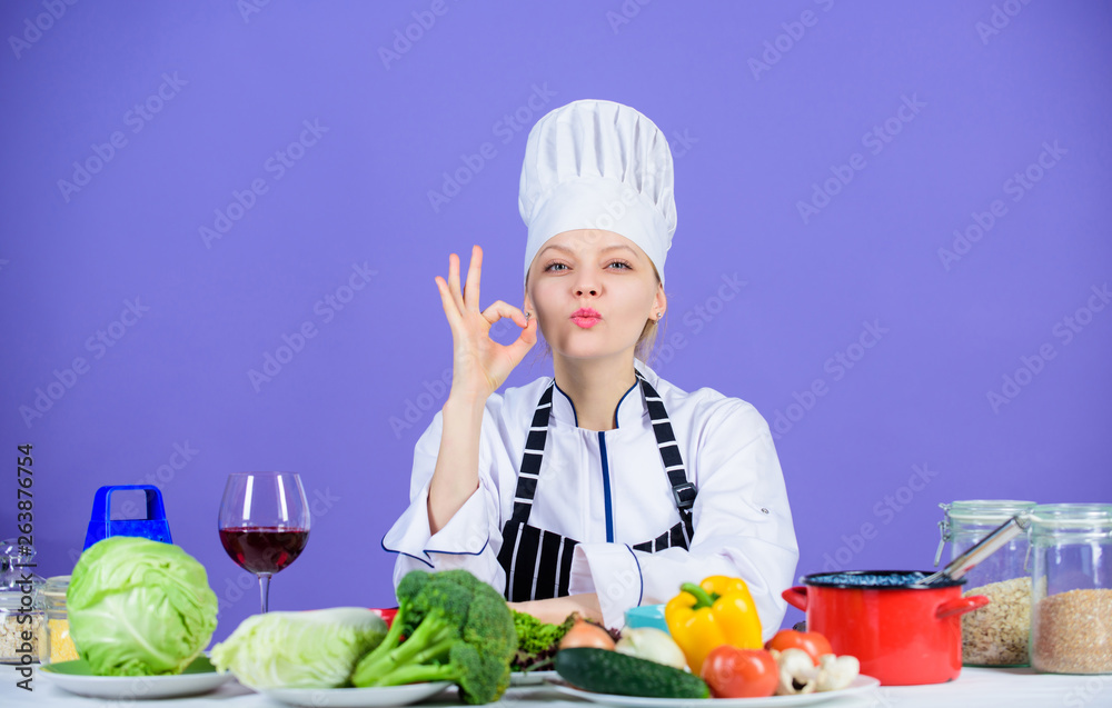 Girl adorable chef teach culinary. Best culinary recipes to try at home. Perfect recipe. Turn ingredients into delicious meal. Culinary skills. Woman chef wear hat apron near table ingredients Girl adorable chef teach culinary. Best culinary recipes to try at home. Perfect recipe. Turn ingredients into delicious meal. Culinary skills. Woman chef wear hat apron near table ingredients