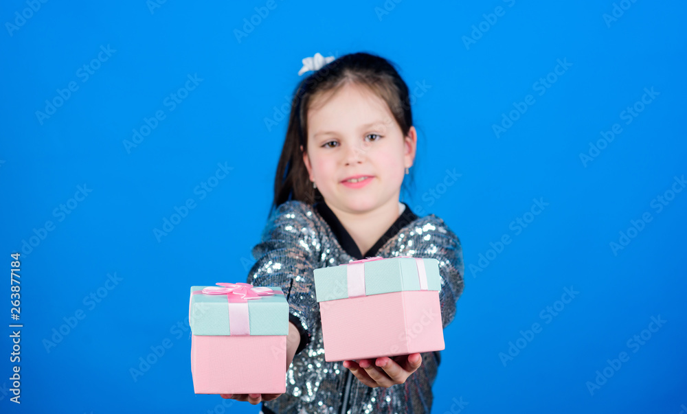 Black friday. Shopping day. Cute child carry gift boxes. Surprise gift box. Birthday wish list. World of happiness. Special happens every day. Choose one. Girl with gift boxes blue background Black friday. Shopping day. Cute child carry gift boxes. Surprise gift box. Birthday wish list. World of happiness. Special happens every day. Choose one. Girl with gift boxes blue background