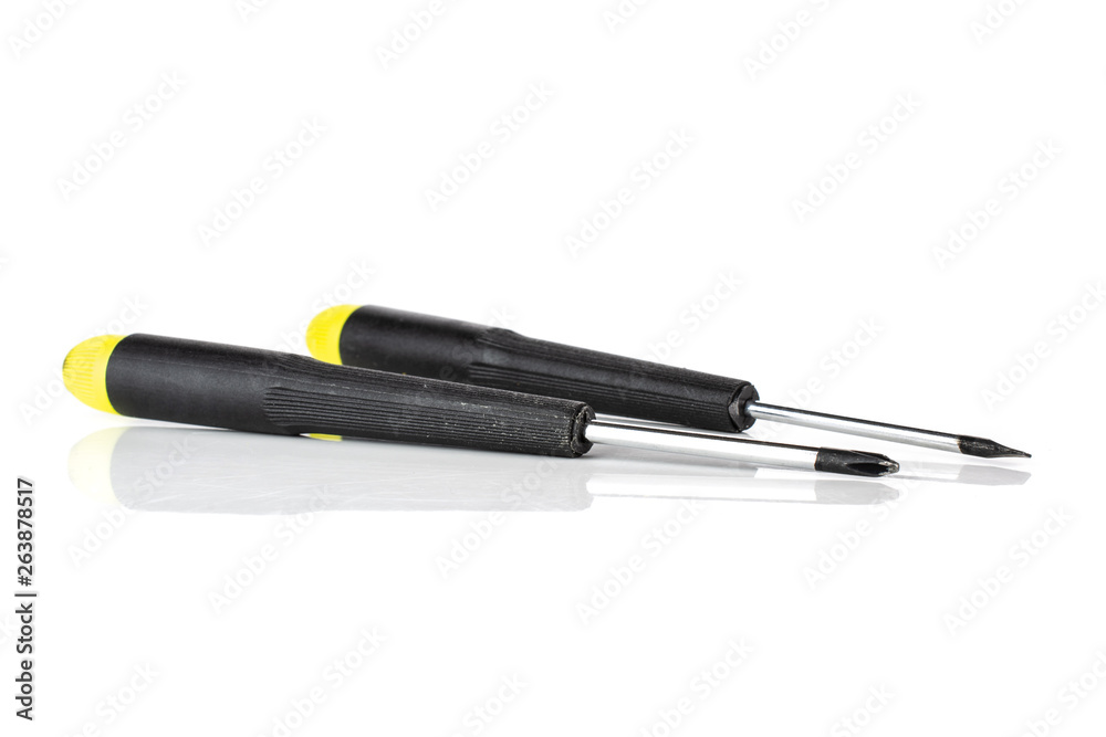 Group of two whole screwdrivers with a yellow black plastic handle work item isolated on white background Group of two whole screwdrivers with a yellow black plastic handle work item isolated on white background