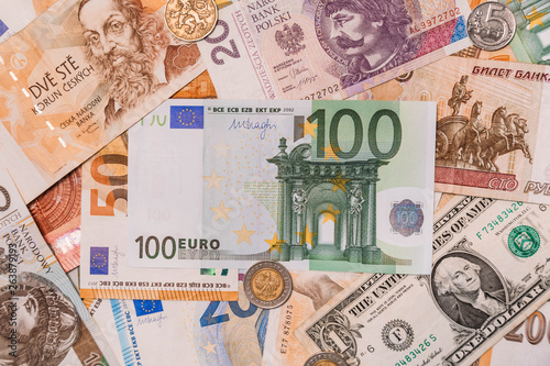 Various paper money euro and dollar banknotes as background. many different currencies as colorful background concept global money.