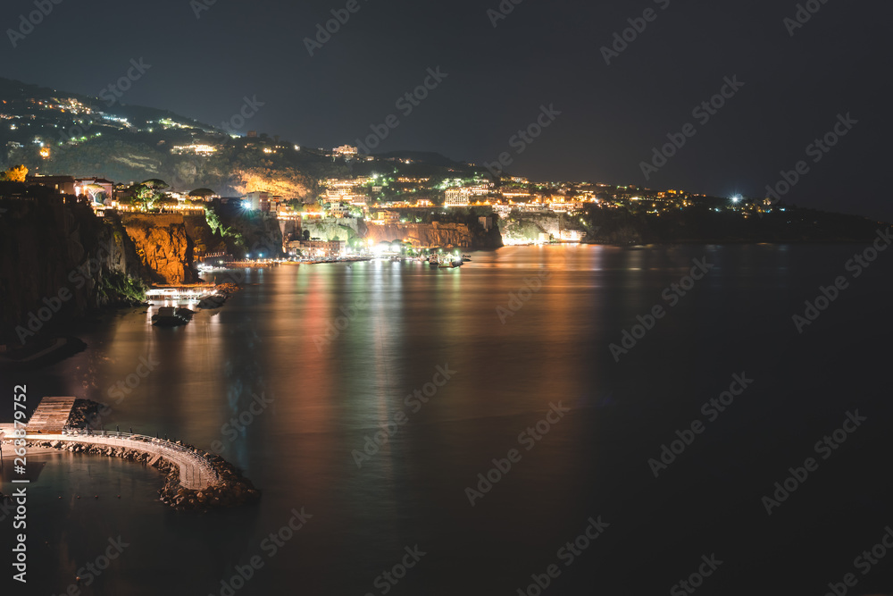 Obraz premium Night view of Sorrento, Italy. Travel background