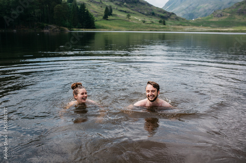 Couple swimming in a lake