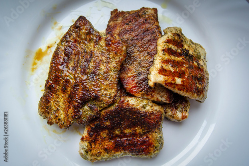 Obraz na płótnie Homemade steaks on a plate w salonie