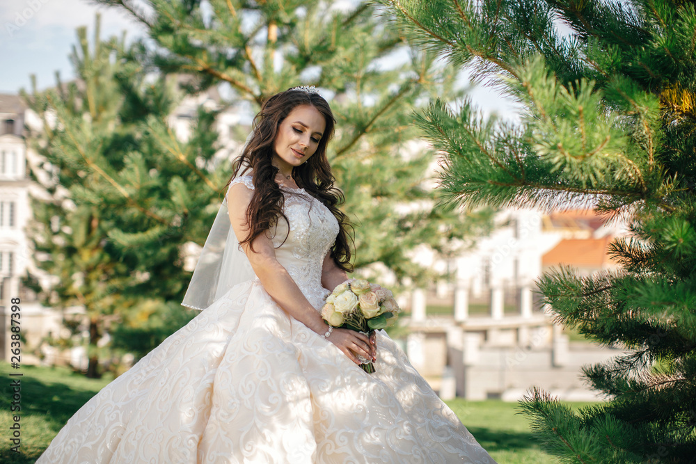 Tender bride with a bouquet of flowers Tender bride with a bouquet of flowers