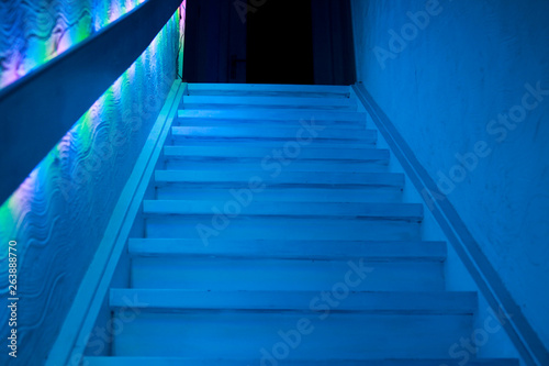 Staircase in dimmed gloomy blue light