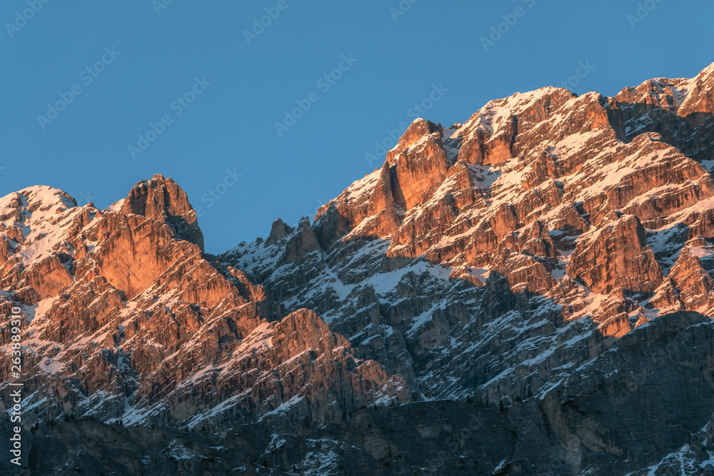 Beautiful sunset in the mountains in winter. Cortina d’Ampezzo - Alps, Dolomites, Italy.