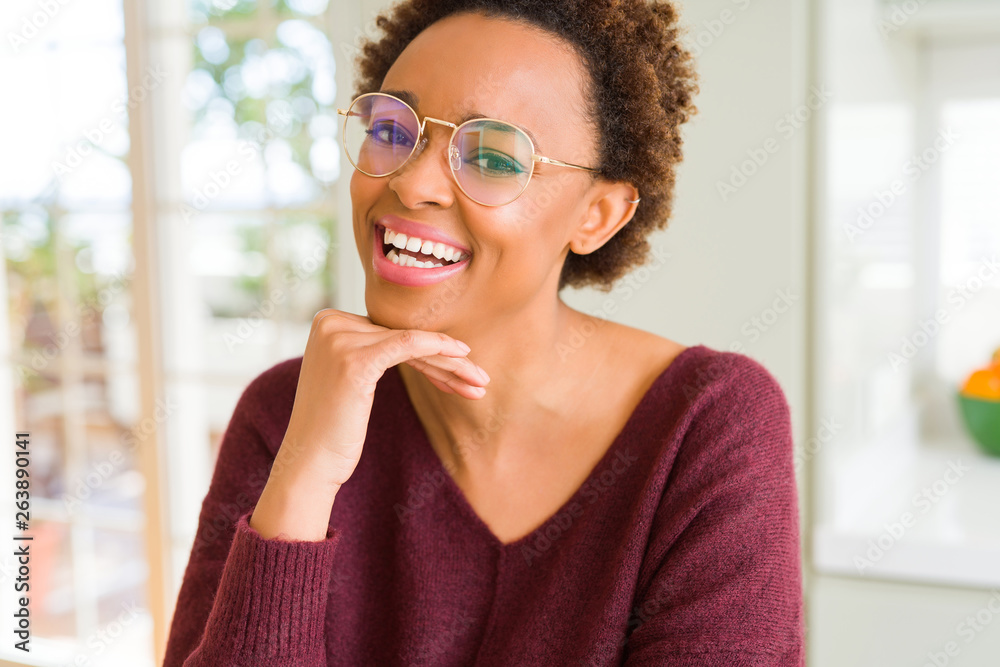 Beautiful young african woman with afro hair wearing glasses Beautiful young african woman with afro hair wearing glasses