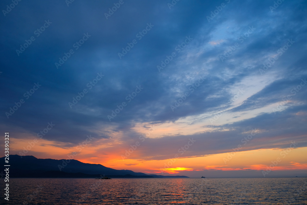 beautiful sunset over the Ionian Sea near the coast of Greece
