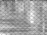 wire mesh enclosure of football field black and white style