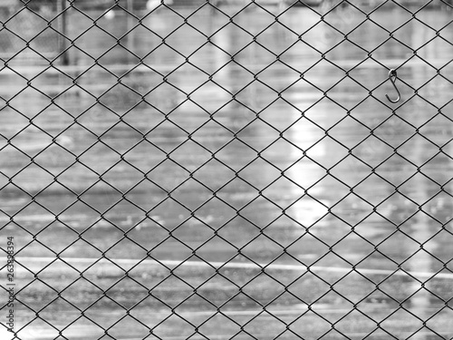 wire mesh enclosure of football field black and white style