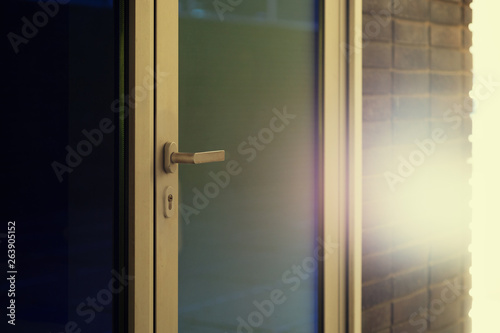 Closed glass door in the sunlight