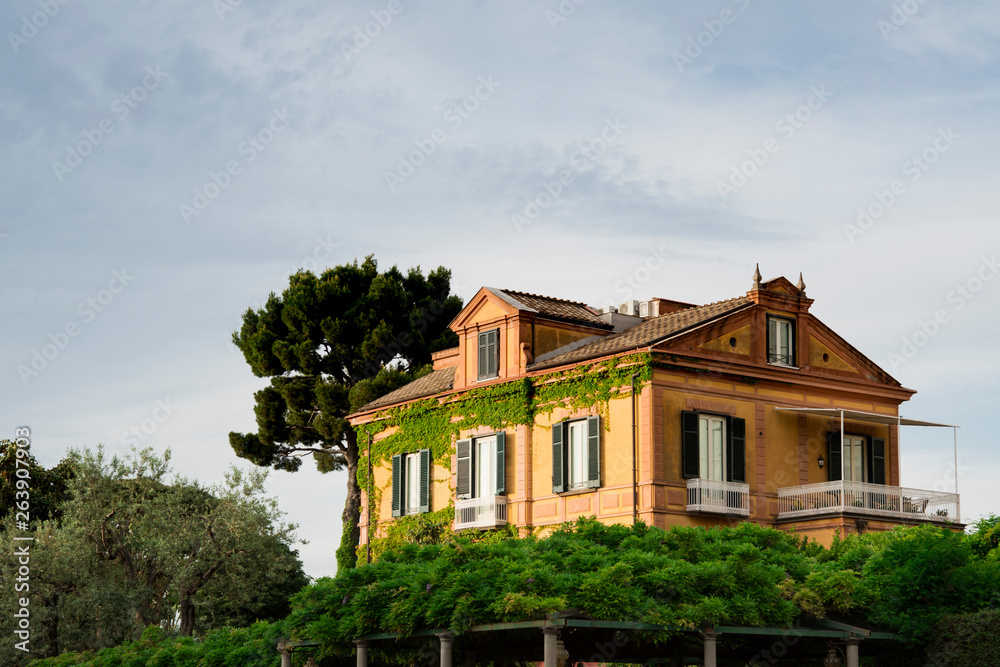 orange house with shutters and green in Sorrento, Amalfi coast, Italy orange house with shutters and green in Sorrento, Amalfi coast, Italy