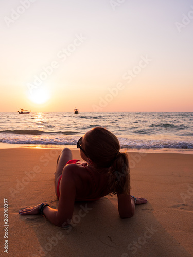 young woman on the sea at sunset © Netfalls