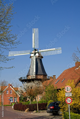 Mill in the tranquil fishing village of Ditzum photo
